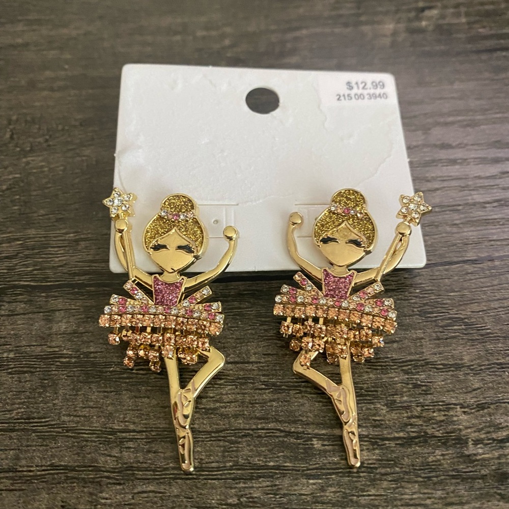 Ballerina dangle earrings.